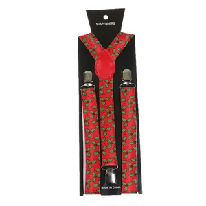 Detail of red Christmas suspenders with holly leaf patterns and silver metal clips