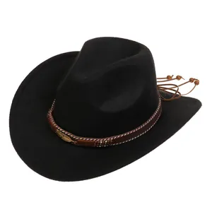 Detail of black felt cowboy hat featuring golden feather buckle and wooden beads decor