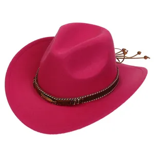Detail of fuchsia wool felt cowboy hat with beaded leather band and golden feather