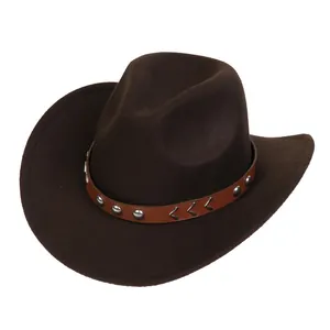 Detailed view of dark brown felt cowboy hat with leather band and silver metal studs
