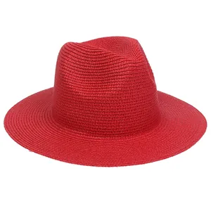 Classic red straw panama hat with elegant woven texture and flat brim for sun protection