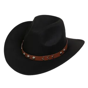 Detail of black western cowboy hat with brown studded band and silver metal accents