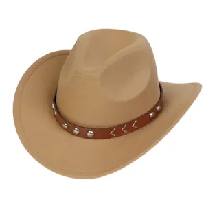 Close-up of camel felt cowboy hat with leather band, silver studs and metal V-accents