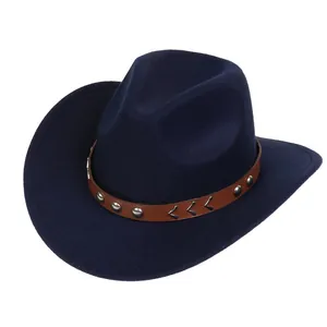 Detail of navy blue felt cowboy hat with studded brown leather band and silver V-decor