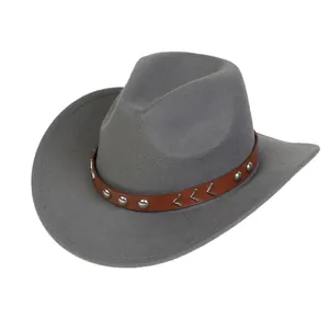 Detail of grey felt cowboy hat featuring a brown band with silver studs and metal accents