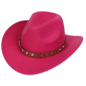 Detail of rose red western cowboy hat with studded brown leather band and silver V-decor