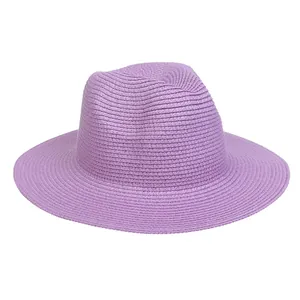 Detailed close-up of light purple panama straw hat with fine texture and fedora style