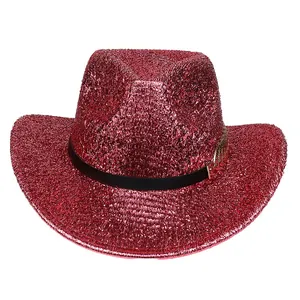 Close-up of red sequin cowboy hat with black leather band and gold feather buckle detail