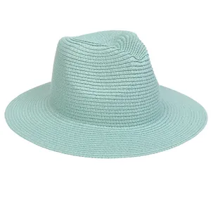 Detailed weave texture of the light blue foldable Panama straw hat for sun protection