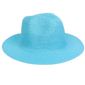 Detail view of the fine woven texture and crown crease of this light blue straw hat