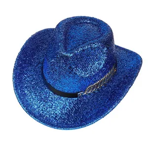 Detail of blue sequined cowboy hat with black band and golden feather ornament