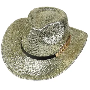 Close-up of the glittery fabric texture and gold feather buckle on the cowboy hat
