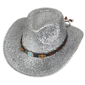 Vue de dessus du chapeau de cowboy argenté avec pierre turquoise et ruban en cuir décoratif