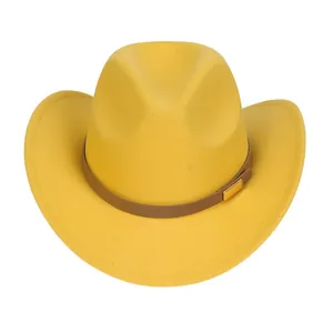 Detail of yellow wool fedora hat featuring a brown leather band and gold metal buckle