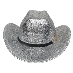 Detail of silver sequin western cowboy hat with black decorative band and gold buckle