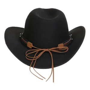 Detailed close-up of felt cowboy hat with brown leather band and metal bead decoration