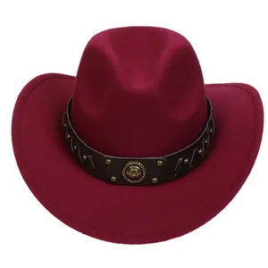 Detail of dark wine red wool fedora with brown leather band and bronze rivets