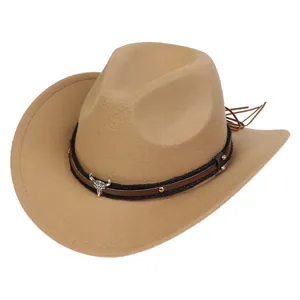 Detail of khaki cowboy hat featuring silver bull head buckle and brown leather fringe