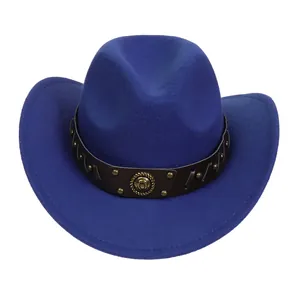 Detail of royal blue felt cowboy hat with leather band and gold horseshoe emblem