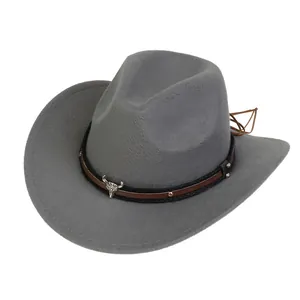 Detailed view of grey wool cowboy hat with decorative bull skull charm and braided cord