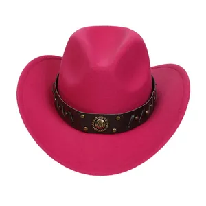Detail of western cowboy hat in rose red felt with studded leather band and gold badge