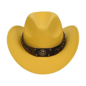 Detail of yellow felt cowboy hat featuring a leather band with horseshoe metal badges