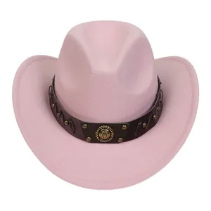 Pink felt cowboy hat featuring brown leather band with retro metal badges and rivets