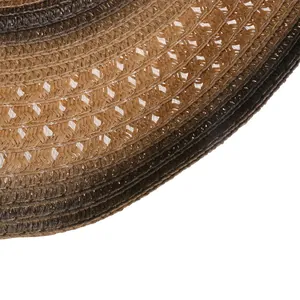 Macro shot of spiral woven straw texture with a brown gradient finish on the hat