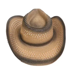 Detail of gradient brown woven straw cowboy hat showing texture and ventilation holes