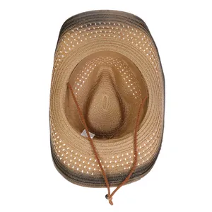 Detail view of woven western cowboy straw hat with gradient color and adjustable chin strap