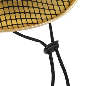 Detail of gold metallic stage hat with black grid pattern and adjustable chin strap
