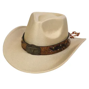 Detail of beige western cowboy hat with vintage bull head buckle and metallic studs