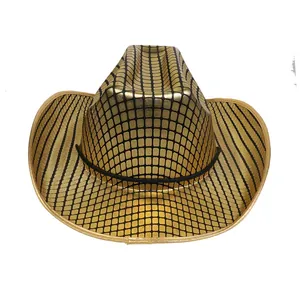Detailed close-up of metallic gold cowboy hat with black mesh texture and trim