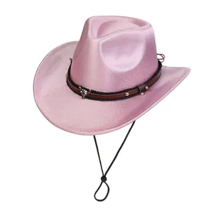 Detail of pink metallic cowboy hat with silver bull head ornament and adjustable chin strap