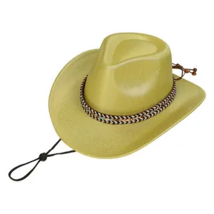 Macro shot of bright yellow western cowboy hat with ethnic woven band and adjustable chin strap