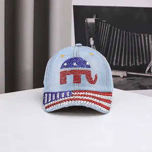 Close-up of rhinestone GOP elephant and star pattern on light blue denim baseball cap