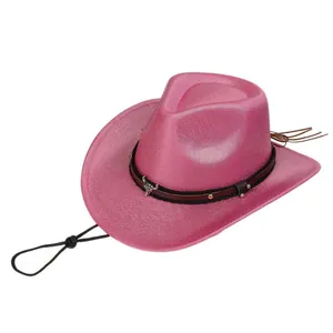 Detail of western cowboy hat with silver bull head ornament and shiny pink glitter finish