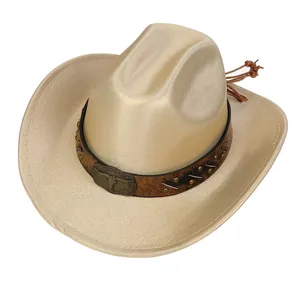 Detail of western cowboy hat with metal bull head emblem and beaded tassels
