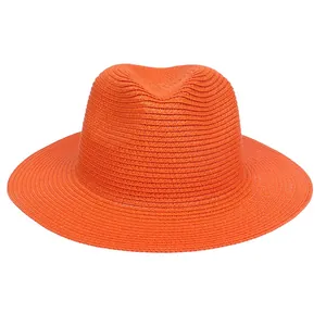 Faltbarer hellorangefarbener Strohhut im Panama-Stil für Sonnenschutz und Strandurlaub