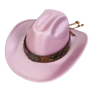 Detail of glitter pink cowboy hat with vintage bull head buckle and metallic studs