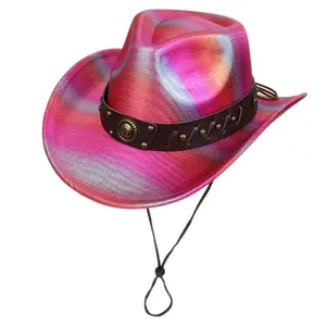 Detail of pink holographic cowboy hat with studded leather band and vintage metal emblem