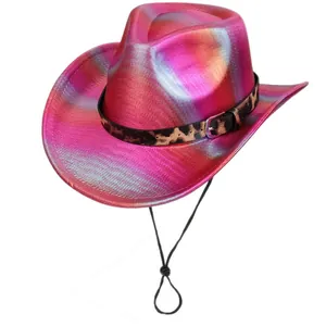 Close-up of iridescent pink cowboy hat featuring leopard print band and adjustable chin strap