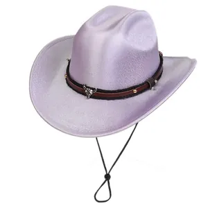 Detail of lavender western cowboy hat featuring metallic glitter finish and bull head charm
