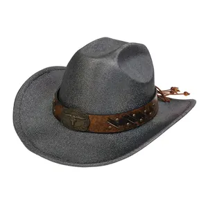 Detail of western cowboy hat with brown leather band, metal bullhead and rivet studs