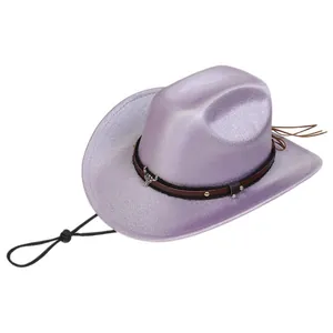 Detail of purple glitter cowboy hat with bull head emblem and braided trim on white background