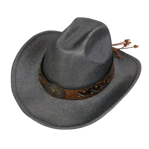 Macro shot of silver cowboy hat with bull head buckle and brown leather tassels