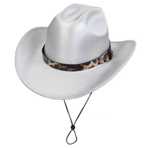 Close-up of shiny silver cowboy hat featuring a leopard print band and adjustable chin strap