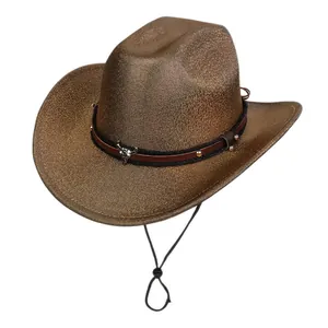 Detail of western cowboy hat with silver bull head ornament and leather studded band