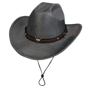 Close-up of silver-grey western cowboy hat with bull head ornament and leather band