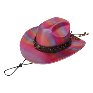 Detail of pink gradient cowboy hat with metallic studs and vintage emblem decoration